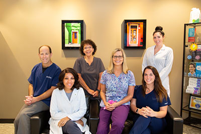 Doctor and staffs group picture at Stephen L Ruchlin DDS 