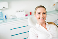 woman smiling at dental office